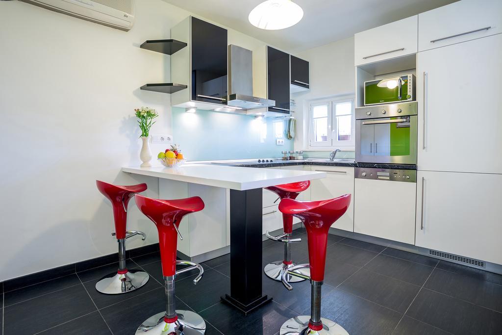 Apartments Biserka Бол Стая снимка